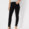 Petite Mid-Rise Skinny Jeans in Jet Black Wash - Sculpting Stretch