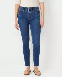 Petite Curvy Sculpting Mid Rise Skinny Jeans in Mid Stone Wash