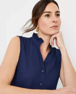 Ruffle Button Sleeveless Top