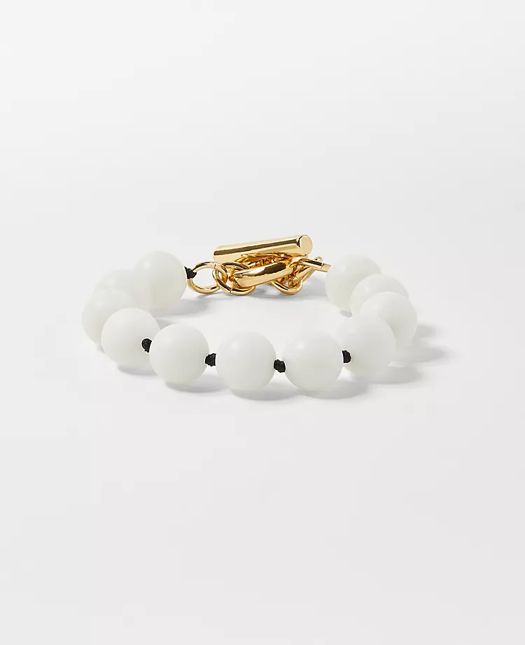 Elegant Polished Beaded Bracelet with Secure Toggle Clasp 1 Elegant Polished Beaded Bracelet with Secure Toggle Clasp
