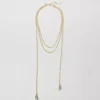 Triple Strand Pearlized Necklace in Polished Gold Tone