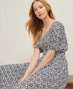 Floral Smocked Puff Sleeve Petite Midi Dress in Black 5 Floral Smocked Puff Sleeve Petite Midi Dress in Black -Ann Taylor Store 857336 522435 ALT2